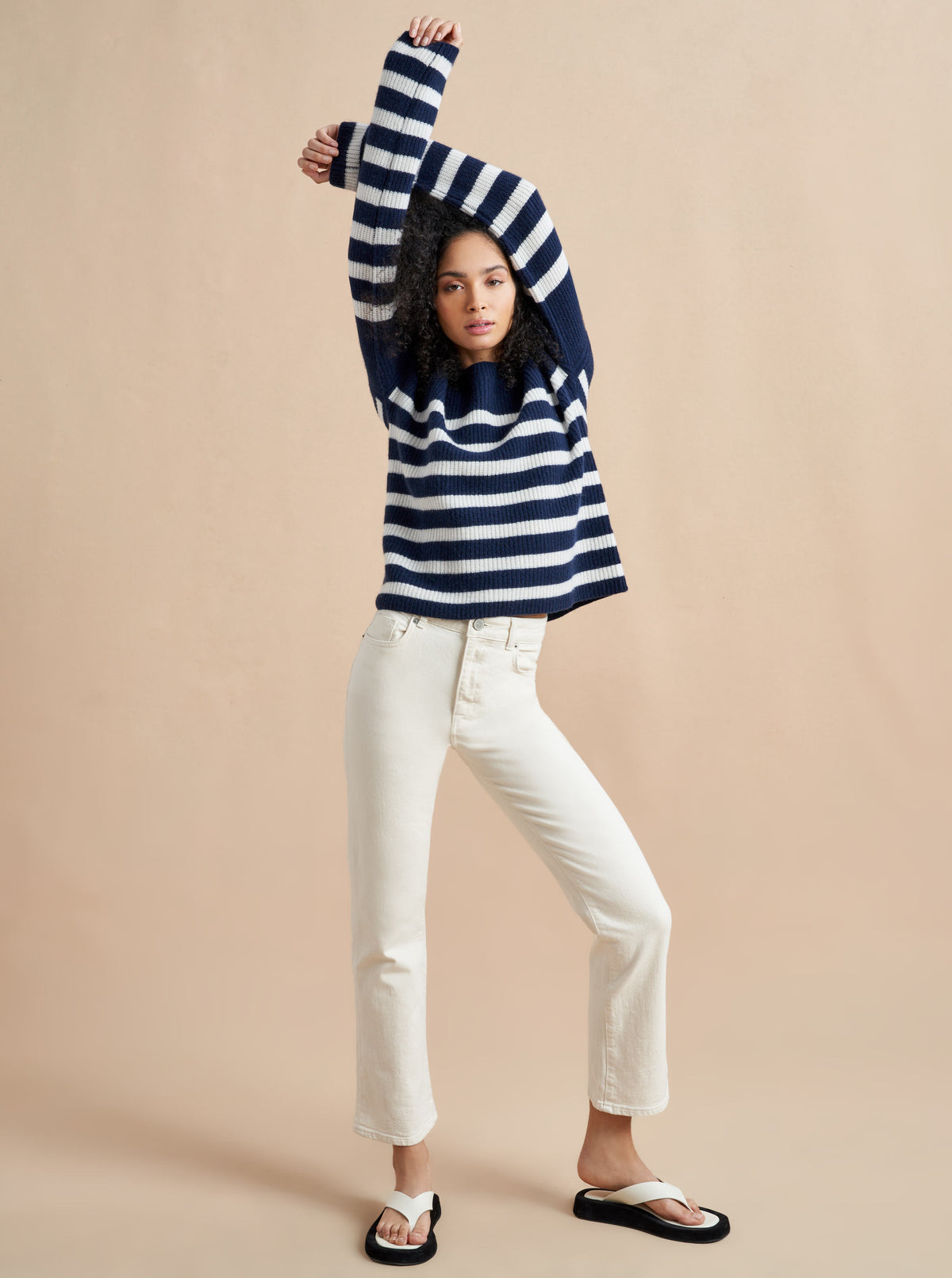 This is it. This is your everyday, never-without, take-with-you-everywhere sweater that will always have your back. Deliciously ribbed cashmere in a loose crewneck and slightly cropped silhouette means you need one in every color for tous les jours. 