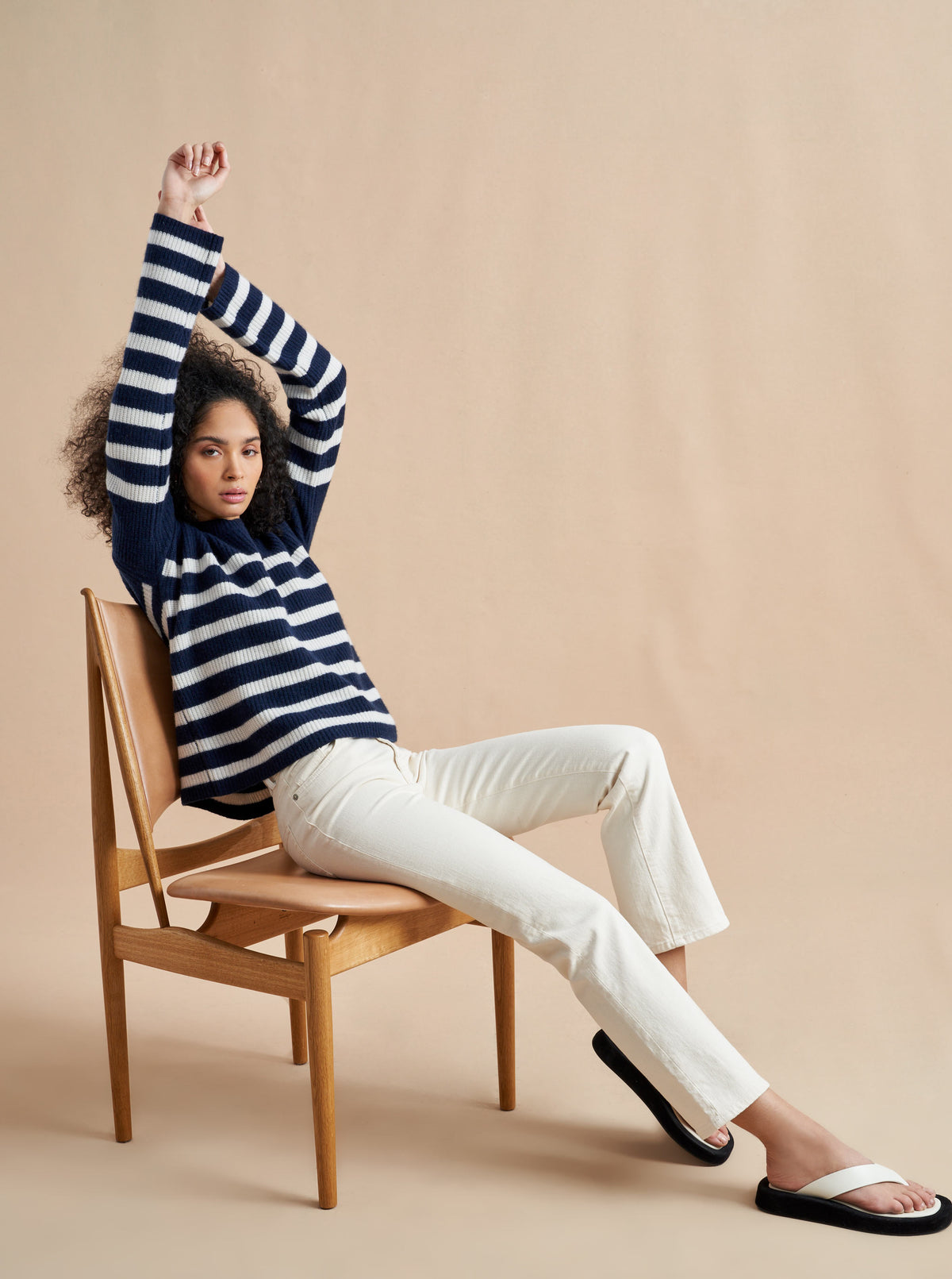 This is it. This is your everyday, never-without, take-with-you-everywhere sweater that will always have your back. Deliciously ribbed cashmere in a loose crewneck and slightly cropped silhouette means you need one in every color for tous les jours. 