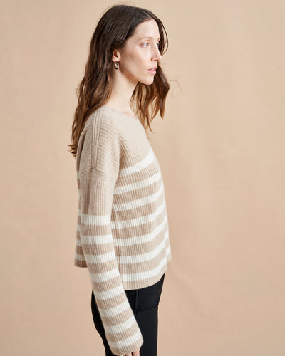 This is it. This is your everyday, never-without, take-with-you-everywhere sweater that will always have your back. Deliciously ribbed cashmere in a loose crewneck and slightly cropped silhouette means you need one in every color for tous les jours. 