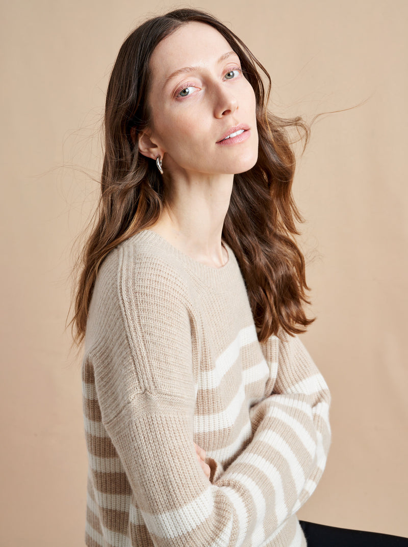 This is it. This is your everyday, never-without, take-with-you-everywhere sweater that will always have your back. Deliciously ribbed cashmere in a loose crewneck and slightly cropped silhouette means you need one in every color for tous les jours. 