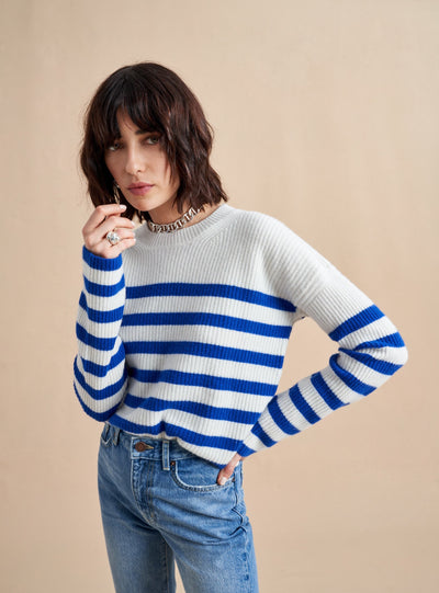 This is it. This is your everyday, never-without, take-with-you-everywhere sweater that will always have your back. Deliciously ribbed cashmere in a loose crewneck and slightly cropped silhouette means you need one in every color for tous les jours. 