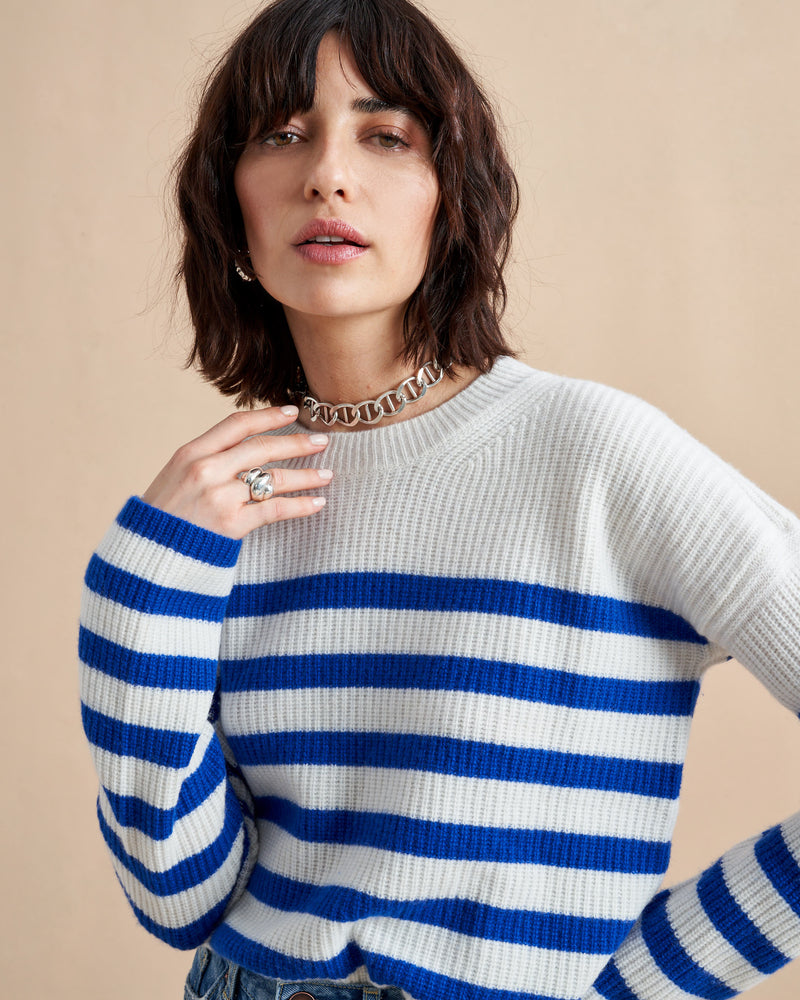 This is it. This is your everyday, never-without, take-with-you-everywhere sweater that will always have your back. Deliciously ribbed cashmere in a loose crewneck and slightly cropped silhouette means you need one in every color for tous les jours. 