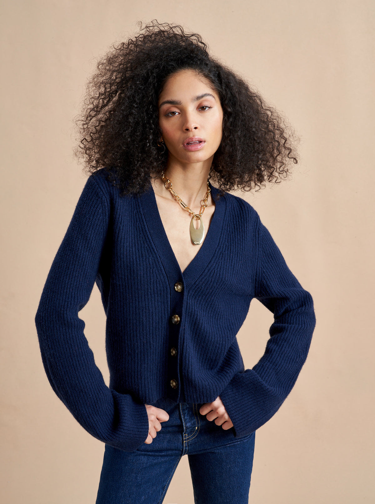 This is it. This is your everyday, never-without, take-with-you-everywhere cardigan that will always have your back. Deliciously ribbed cashmere and slightly cropped silhouette means you need one in every color for tous les jours. 