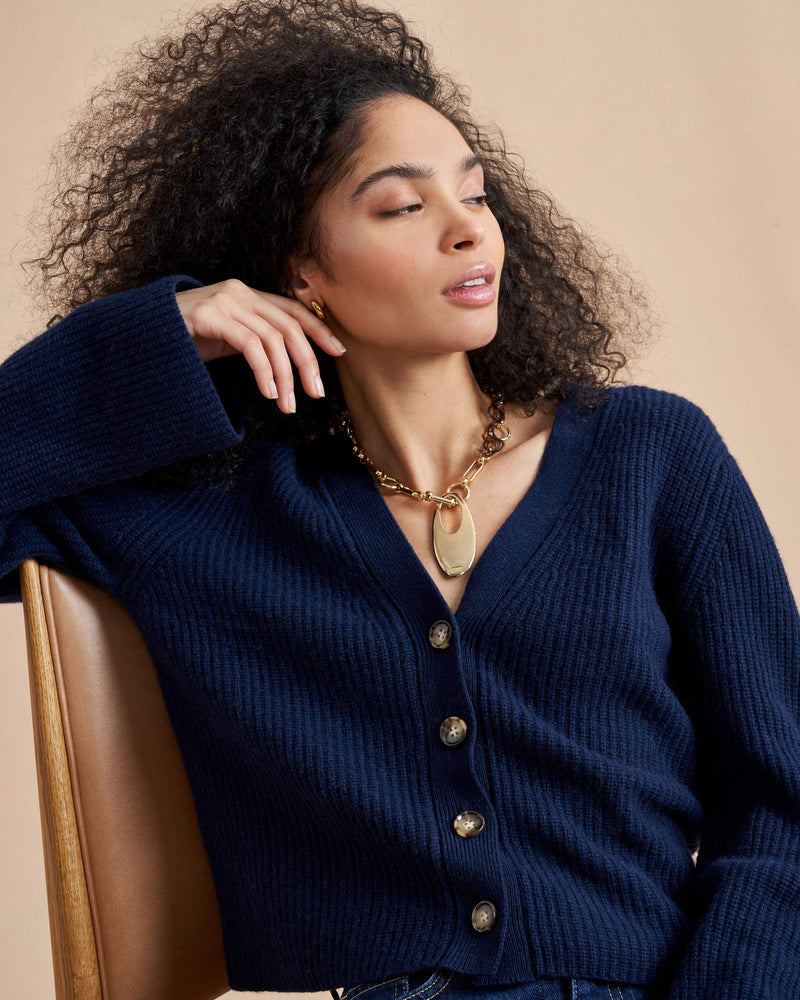 This is it. This is your everyday, never-without, take-with-you-everywhere cardigan that will always have your back. Deliciously ribbed cashmere and slightly cropped silhouette means you need one in every color for tous les jours. 