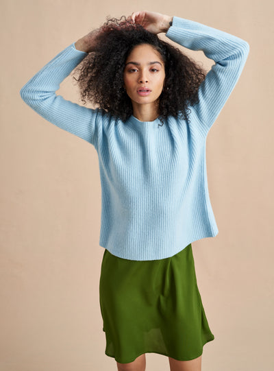 This is it. This is your everyday, never-without, take-with-you-everywhere sweater that will always have your back. Deliciously ribbed cashmere in a loose crewneck and slightly cropped silhouette means you need one in every color for tous les jours. 