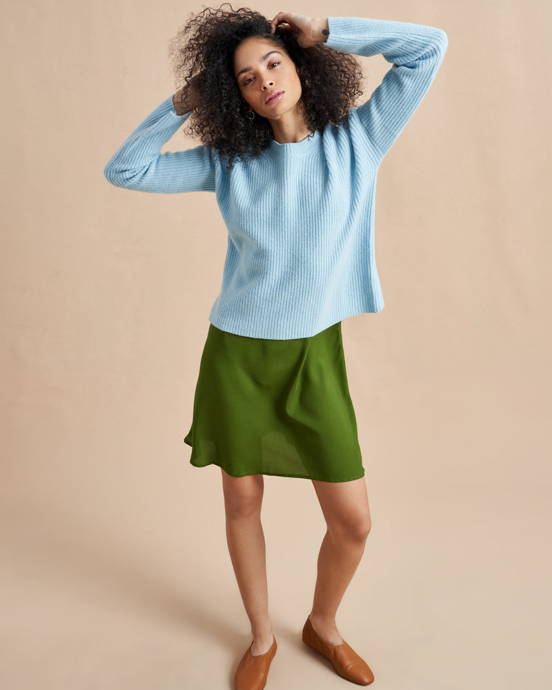 This is it. This is your everyday, never-without, take-with-you-everywhere sweater that will always have your back. Deliciously ribbed cashmere in a loose crewneck and slightly cropped silhouette means you need one in every color for tous les jours. 