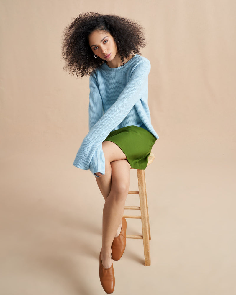 This is it. This is your everyday, never-without, take-with-you-everywhere sweater that will always have your back. Deliciously ribbed cashmere in a loose crewneck and slightly cropped silhouette means you need one in every color for tous les jours. 