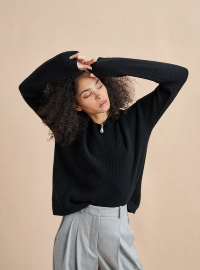 This is it. This is your everyday, never-without, take-with-you-everywhere sweater that will always have your back. Deliciously ribbed cashmere in a loose crewneck and slightly cropped silhouette means you need one in every color for tous les jours. 