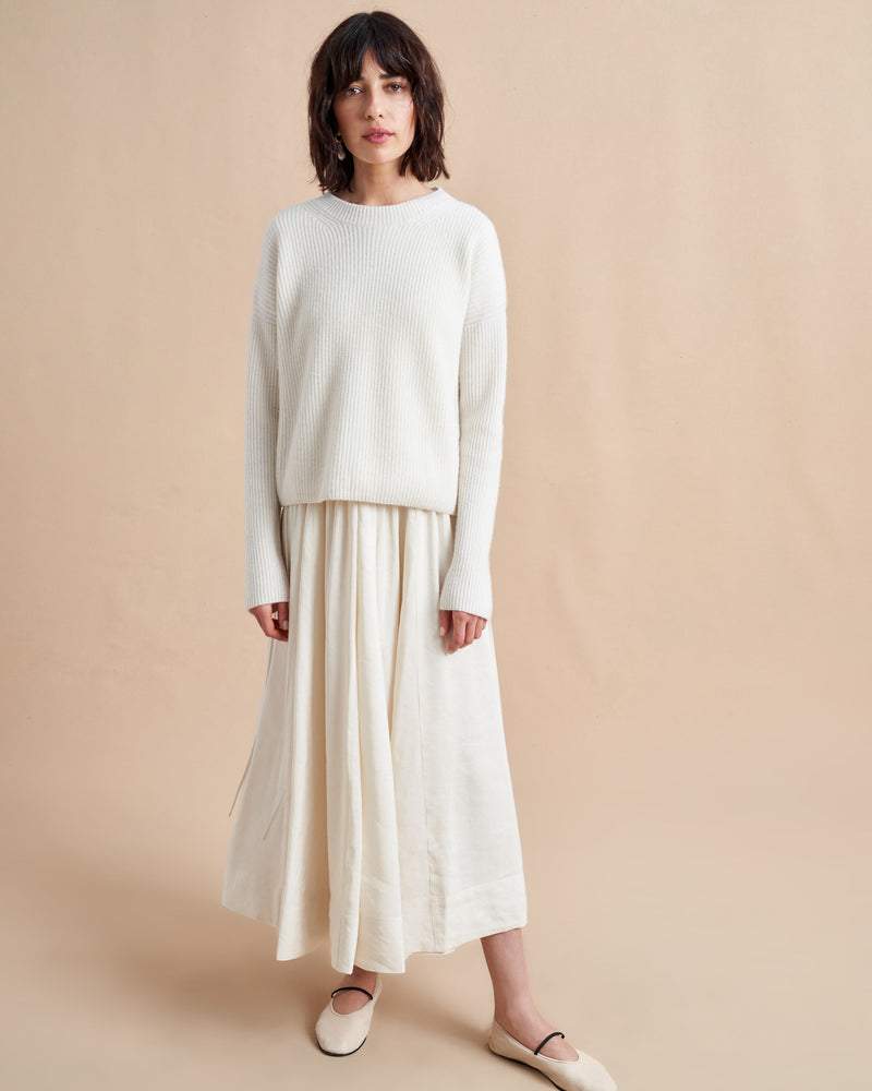 This is it. This is your everyday, never-without, take-with-you-everywhere sweater that will always have your back. Deliciously ribbed cashmere in a loose crewneck and slightly cropped silhouette means you need one in every color for tous les jours. 