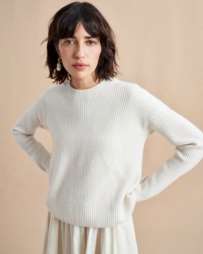 This is it. This is your everyday, never-without, take-with-you-everywhere sweater that will always have your back. Deliciously ribbed cashmere in a loose crewneck and slightly cropped silhouette means you need one in every color for tous les jours. 