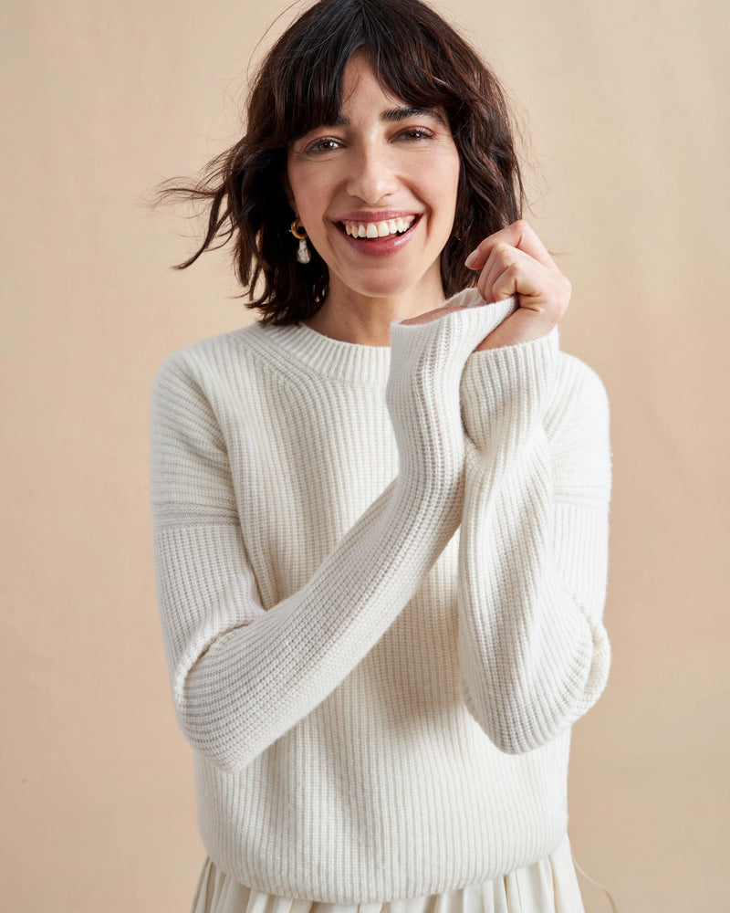 This is it. This is your everyday, never-without, take-with-you-everywhere sweater that will always have your back. Deliciously ribbed cashmere in a loose crewneck and slightly cropped silhouette means you need one in every color for tous les jours. 