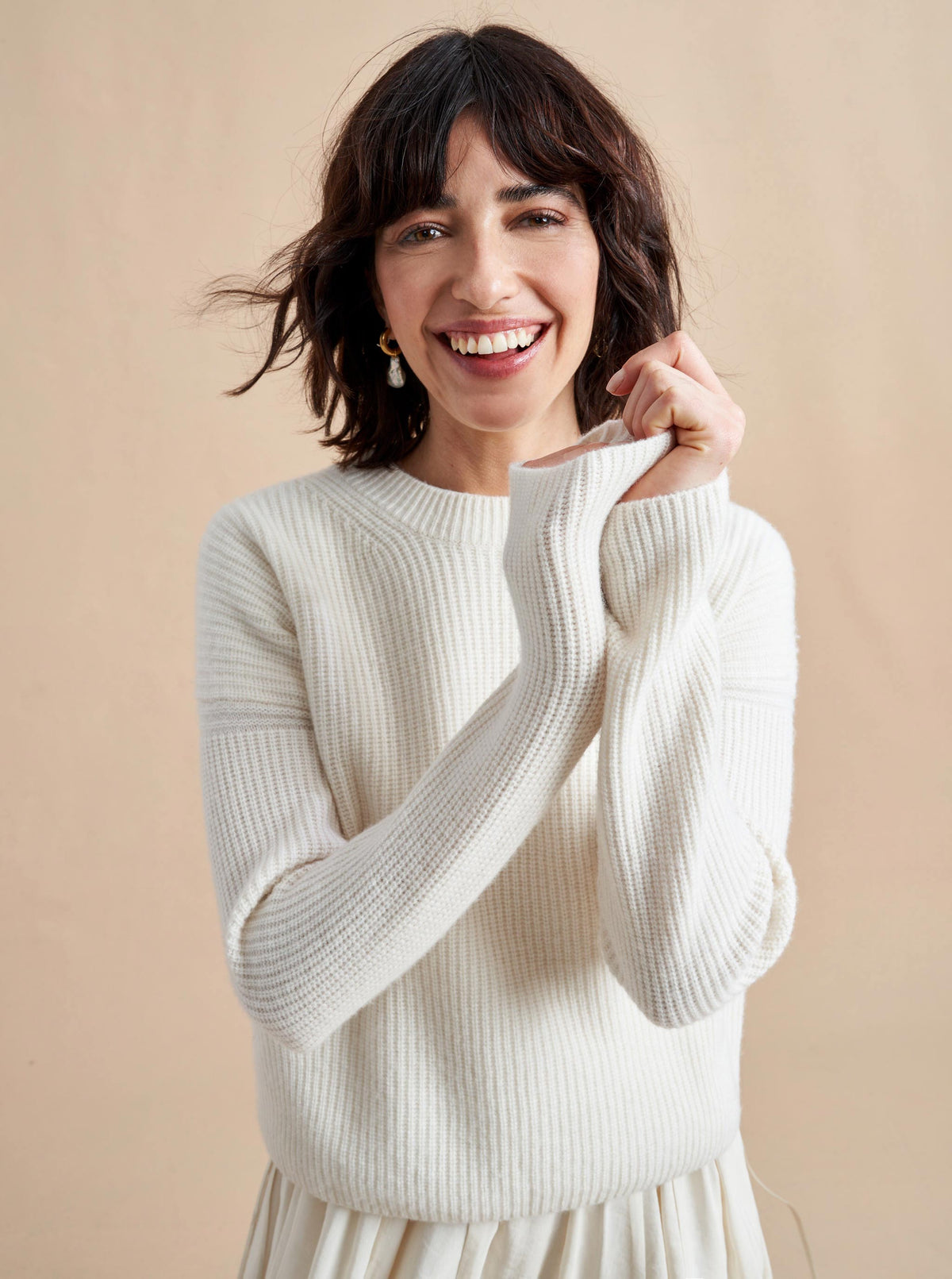 This is it. This is your everyday, never-without, take-with-you-everywhere sweater that will always have your back. Deliciously ribbed cashmere in a loose crewneck and slightly cropped silhouette means you need one in every color for tous les jours. 