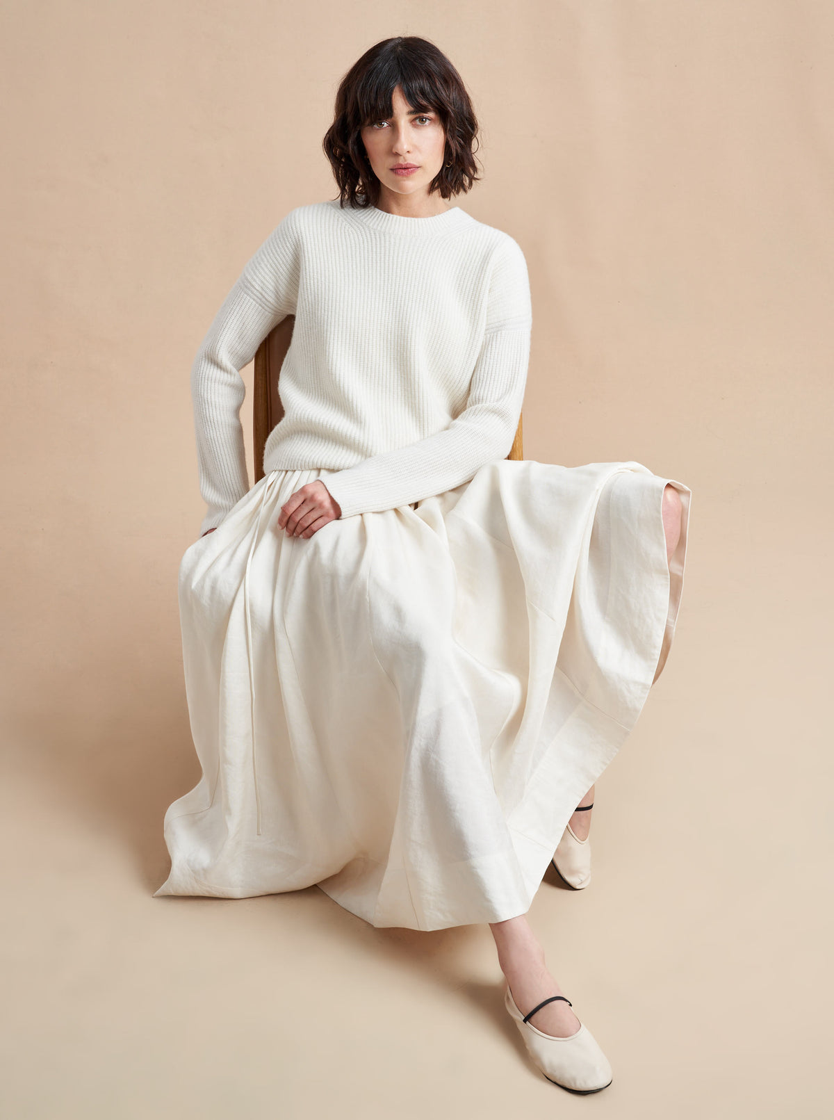 This is it. This is your everyday, never-without, take-with-you-everywhere sweater that will always have your back. Deliciously ribbed cashmere in a loose crewneck and slightly cropped silhouette means you need one in every color for tous les jours. 