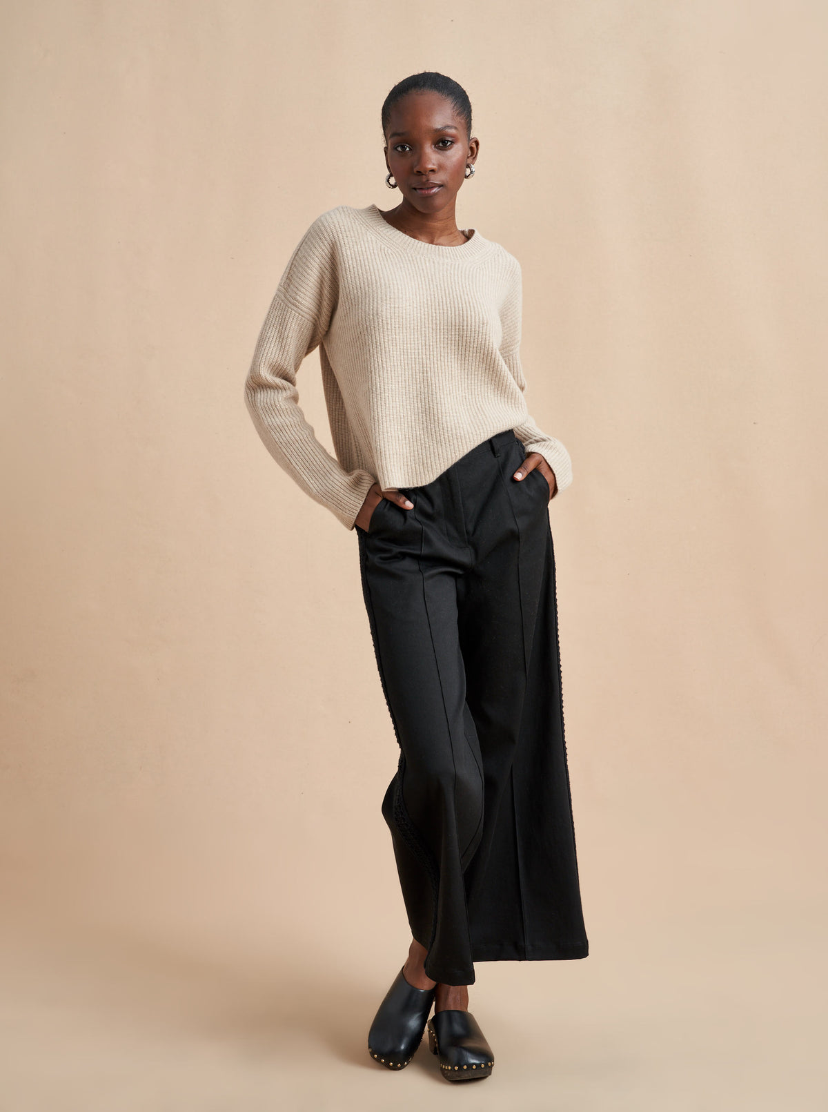 This is it. This is your everyday, never-without, take-with-you-everywhere sweater that will always have your back. Deliciously ribbed cashmere in a loose crewneck and slightly cropped silhouette means you need one in every color for tous les jours. 