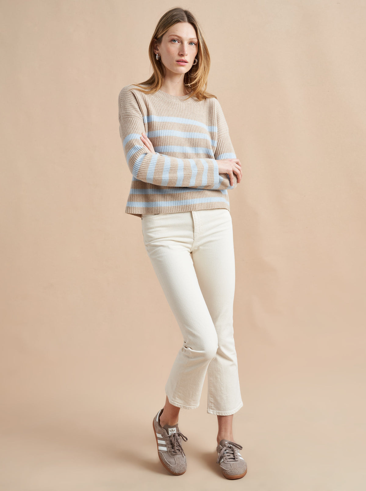 This is it. This is your everyday, never-without, take-with-you-everywhere sweater that will always have your back. Deliciously ribbed cashmere in a loose crewneck and slightly cropped silhouette means you need one in every color for tous les jours. 