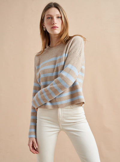 This is it. This is your everyday, never-without, take-with-you-everywhere sweater that will always have your back. Deliciously ribbed cashmere in a loose crewneck and slightly cropped silhouette means you need one in every color for tous les jours. 