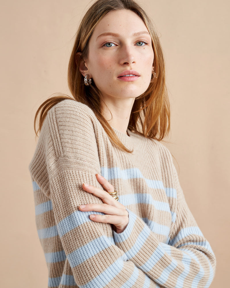 This is it. This is your everyday, never-without, take-with-you-everywhere sweater that will always have your back. Deliciously ribbed cashmere in a loose crewneck and slightly cropped silhouette means you need one in every color for tous les jours. 