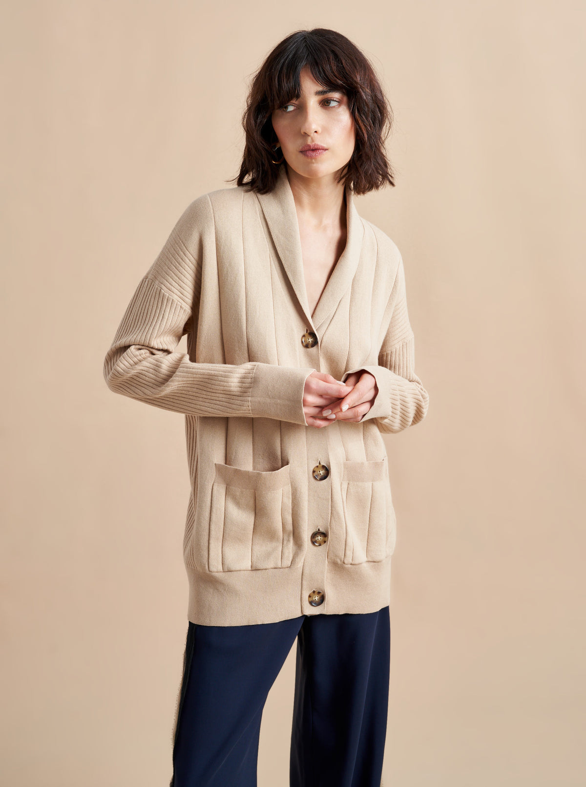 Inspired by our co-founder, Molly Howard, this recycled cotton and cashmere cardigan is the queen of comfort (especially when paired back to the Molly Pants). Wear it as a set, wear it with your favorite jeans, wear it with nothing else at all - whichever way you choose, you'll like how you feel (and how you look).