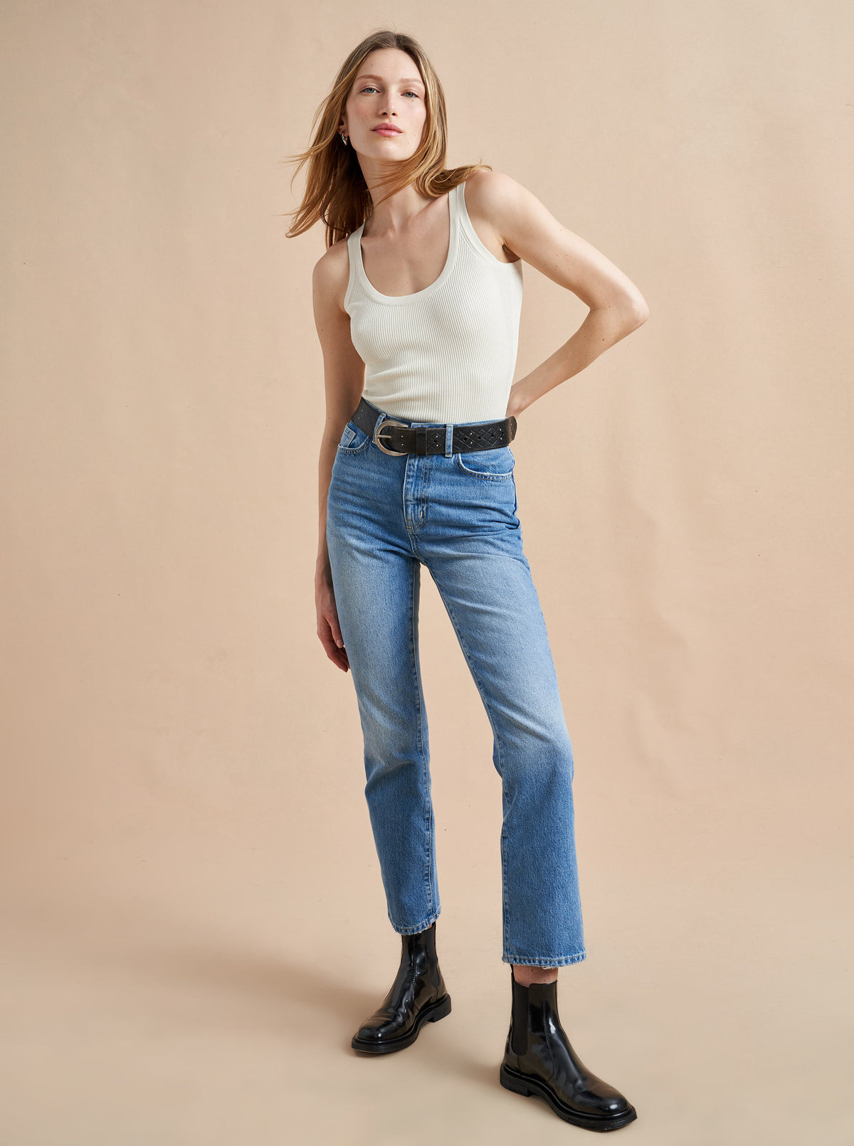 The classic, high-rise, non-stretch, straight-leg jean that gets better after each wear, never goes out of style, never disappoints and you can never get enough of, AKA The Molly jean or The Mom Jean, aptly named after our co-founder that will take you from 9 to 5, after hours and beyond. 