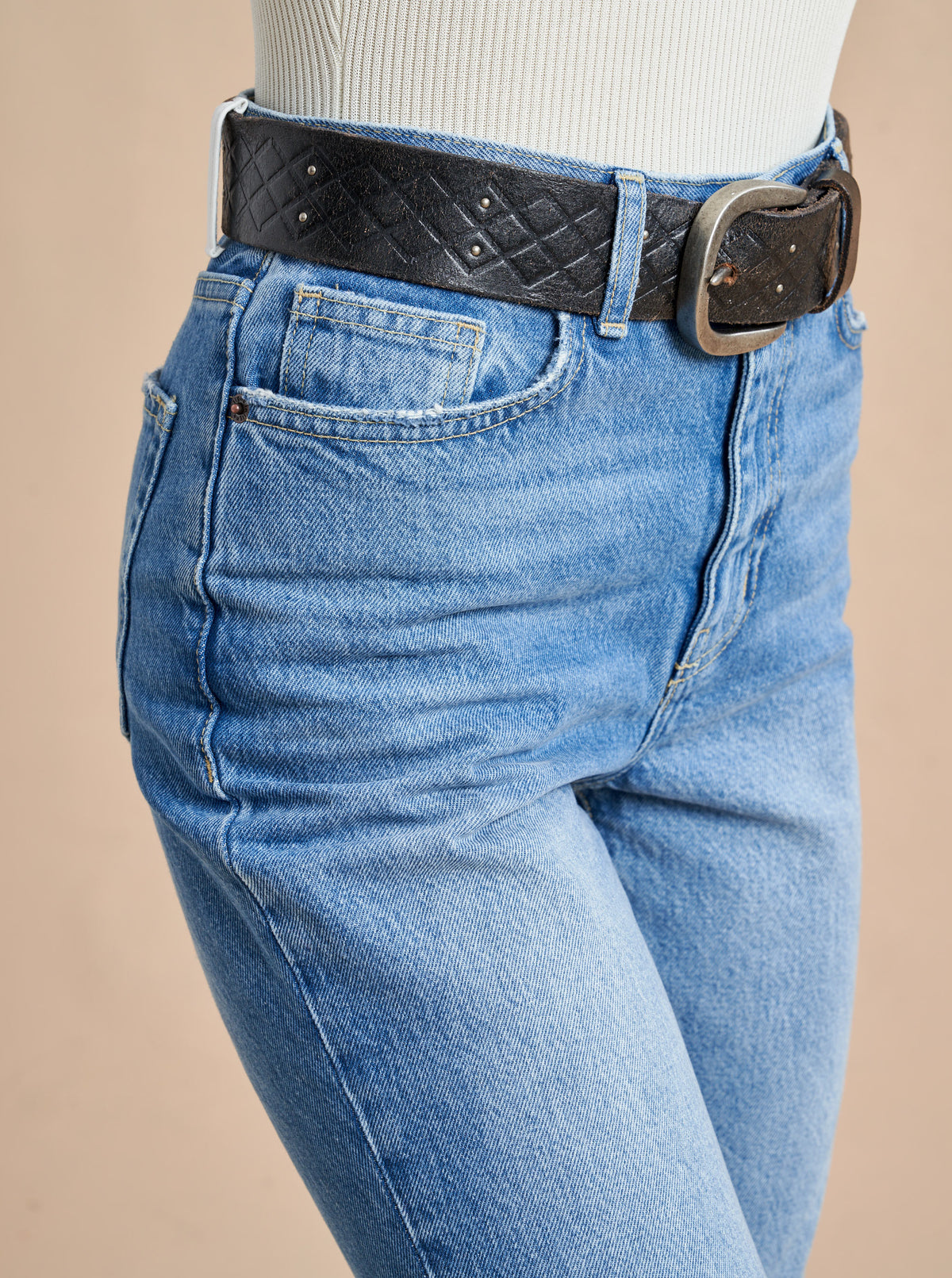 The classic, high-rise, non-stretch, straight-leg jean that gets better after each wear, never goes out of style, never disappoints and you can never get enough of, AKA The Molly jean or The Mom Jean, aptly named after our co-founder that will take you from 9 to 5, after hours and beyond. 