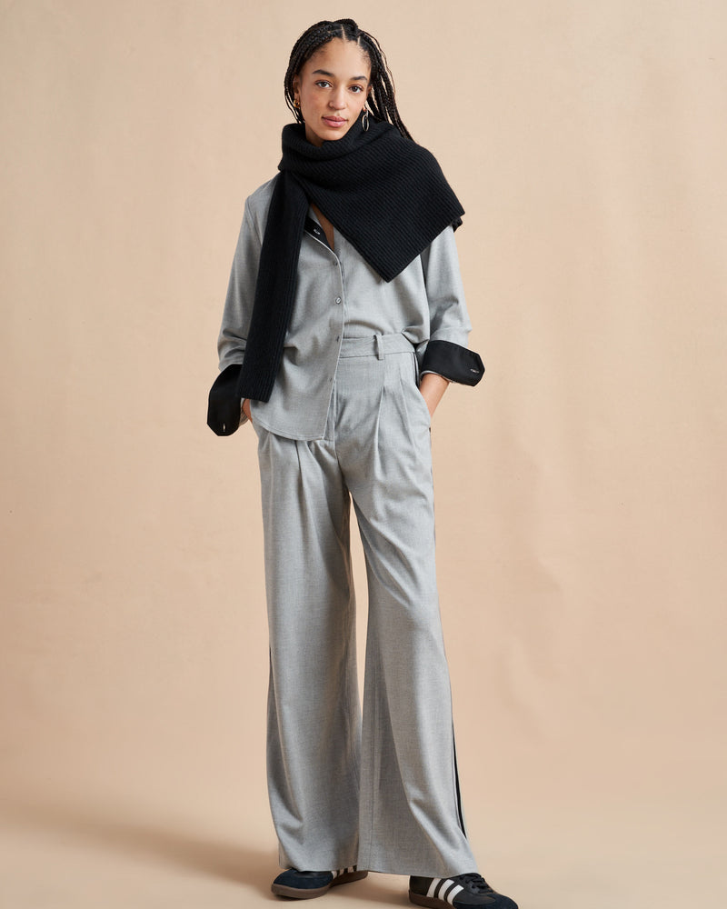 Inspired by La Bande member Selby Drummond, this grey, high waisted pleated trouser is elevated with a hint of sport. Feel free to run away with them in a flat boot or simply strut into a room when you wear them with heels. Just like Selby, there is nothing this pant can't do. 