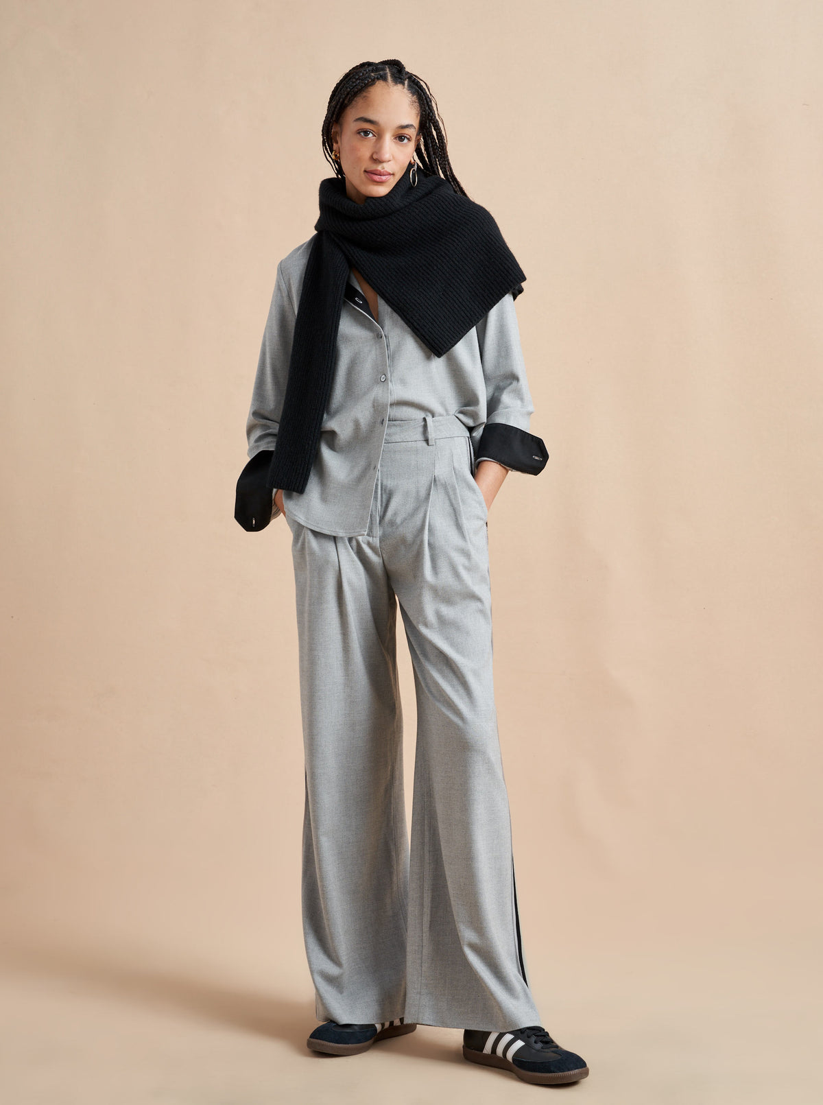 Inspired by La Bande member Selby Drummond, this grey, high waisted pleated trouser is elevated with a hint of sport. Feel free to run away with them in a flat boot or simply strut into a room when you wear them with heels. Just like Selby, there is nothing this pant can't do. 