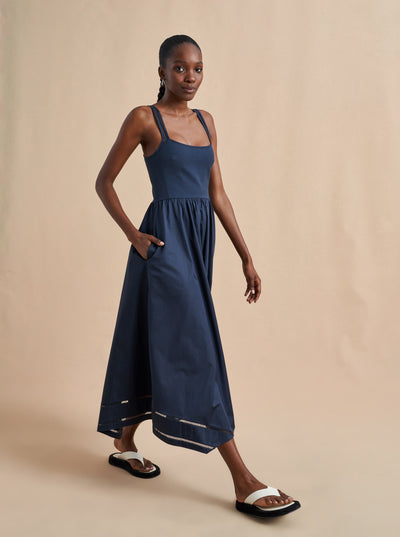 The weather is heating up, the layers are coming off, the materials are getting lighter but that doesn't mean the support is going anywhere. Meet Soraya, our cotton poplin sleeveless dress with stretch bodice to hold you in. Ladder trim stripe details on the straps and at the handkerchief hem round out this A-line dress with side seam pockets. Like we said, we got your back.