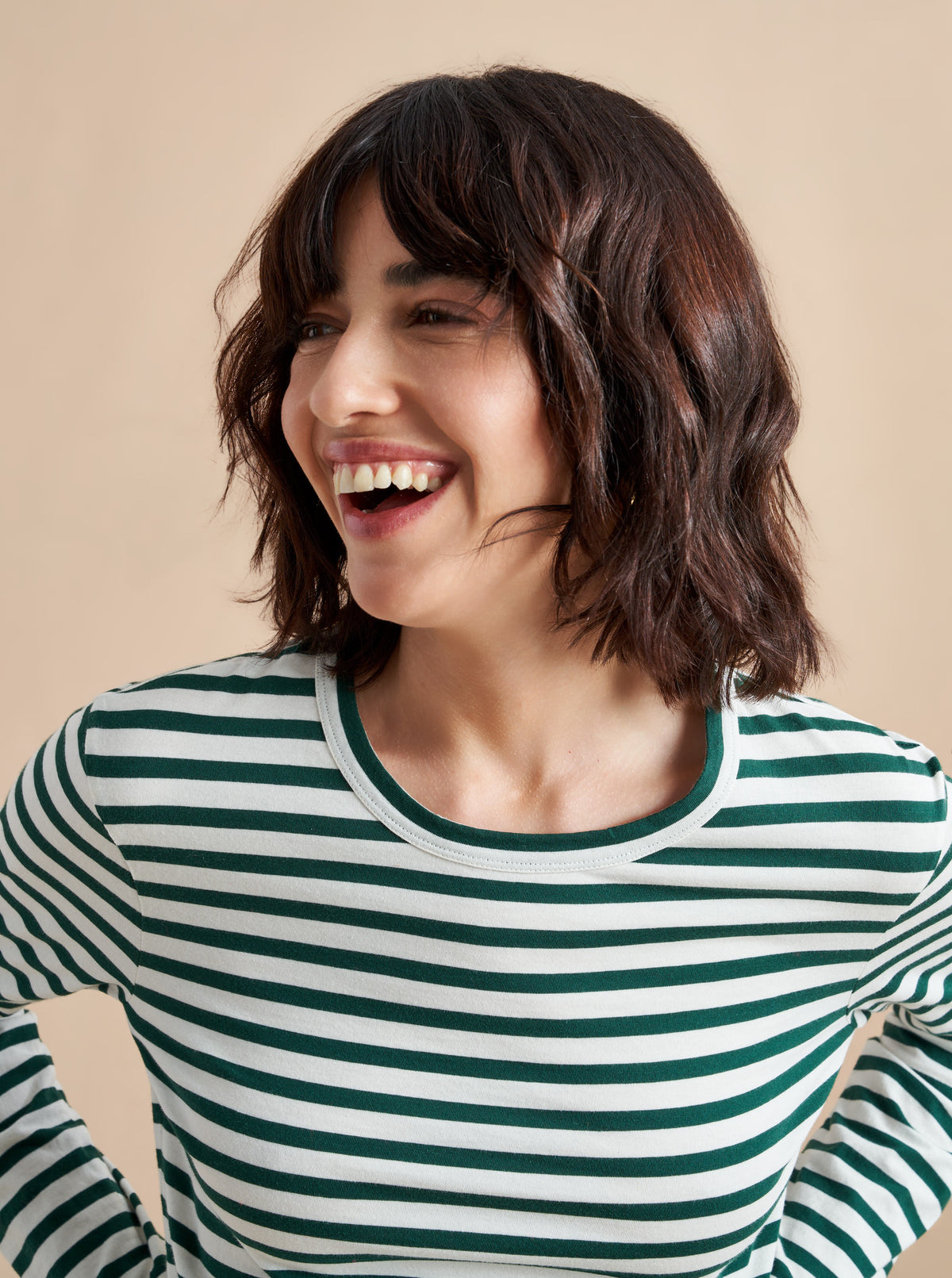 What makes the perfect tee? Why don't you ask our co-founders? Meredith's striped version in super soft cotton is not too fitted, not too oversized with long sleeves, perfect for layering with a pop of color.