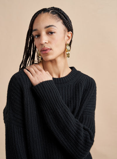 This is it. This is your everyday, never-without, take-with-you-everywhere sweater that will always have your back. Deliciously ribbed cashmere in a loose crewneck silhouette means you need one in every color for tous les jours.