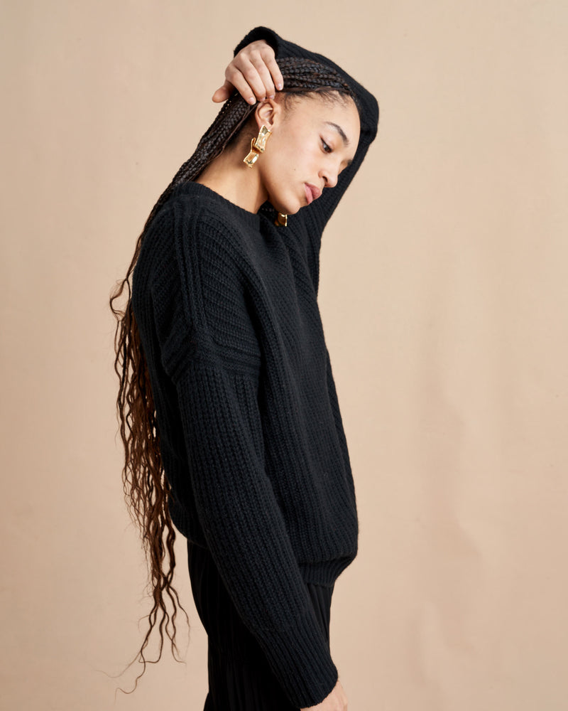 This is it. This is your everyday, never-without, take-with-you-everywhere sweater that will always have your back. Deliciously ribbed cashmere in a loose crewneck silhouette means you need one in every color for tous les jours.