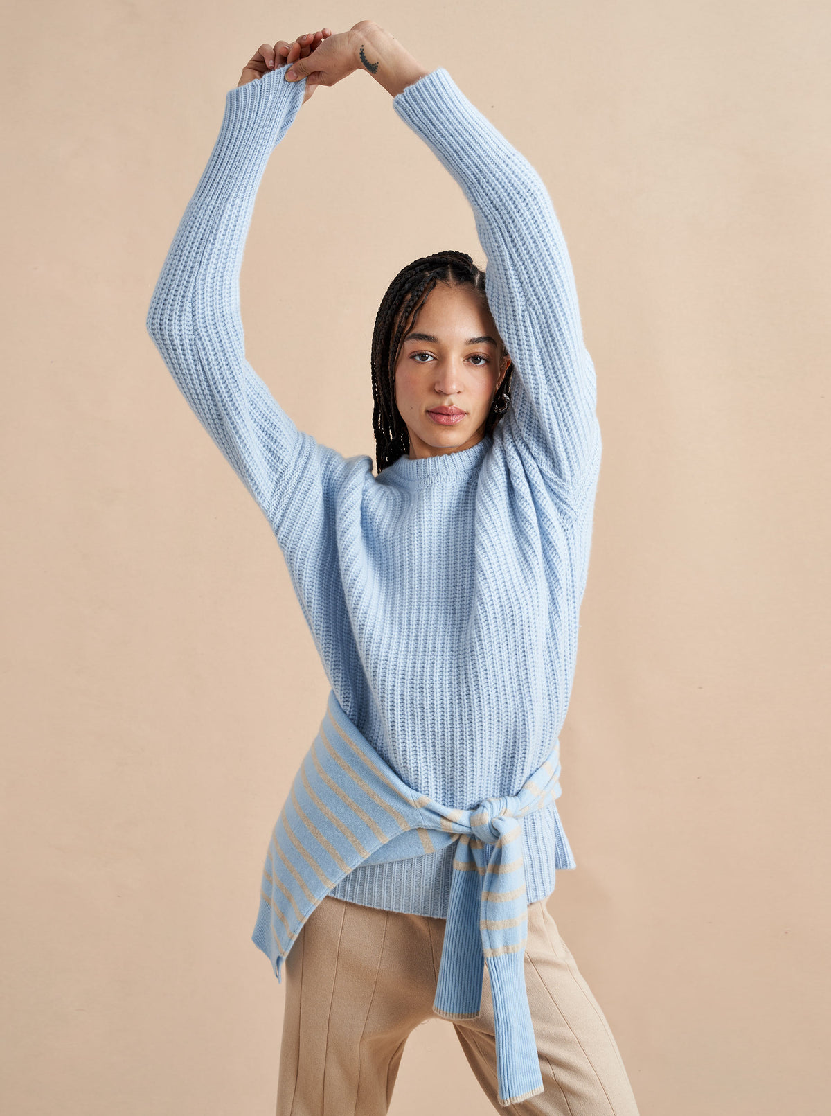 This is it. This is your everyday, never-without, take-with-you-everywhere sweater that will always have your back. Deliciously ribbed cashmere in a loose crewneck silhouette means you need one in every color for tous les jours.