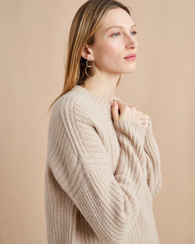 This is it. This is your everyday, never-without, take-with-you-everywhere sweater that will always have your back. Deliciously ribbed cashmere in a loose crewneck silhouette means you need one in every color for tous les jours.