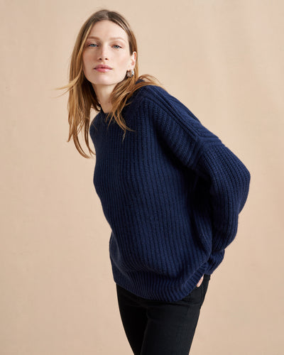 This is it. This is your everyday, never-without, take-with-you-everywhere sweater that will always have your back. Deliciously ribbed cashmere in a loose crewneck silhouette means you need one in every color for tous les jours. 