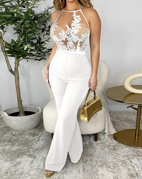 ELEGANCE IN CONTRAST HALTER JUMPSUIT