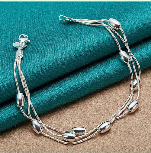 TRIPLE STRAND SILVER CHAIN BRACELET