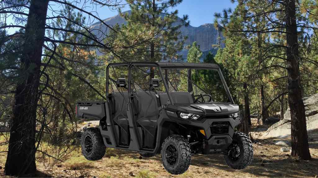 2023 Can-Am Defender MAX DPS HD10 parked near trees