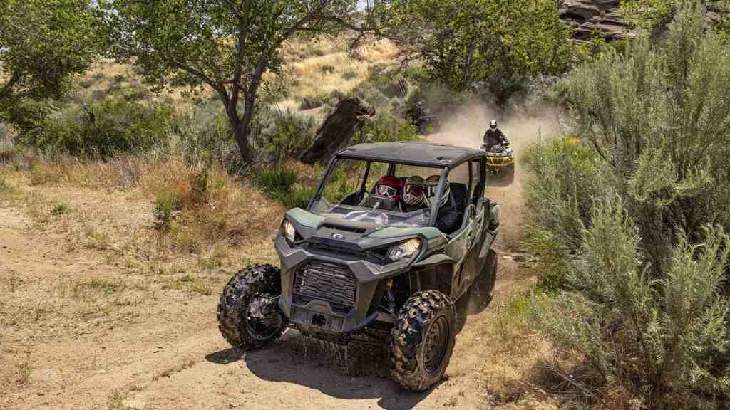 Riding Can-am Commander and ATV on a dirt road
