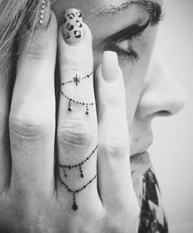 60 Badass Wedding Ring Tattoo Ideas [Inspiration Guide]