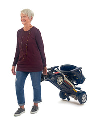 Lady Walking with Buzzaround Scooter