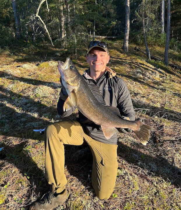 Brandon Johnson with a huge walleye in the Boundary Waters