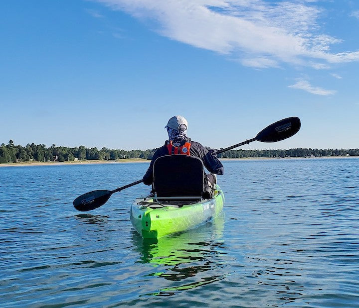 kayaker on the water with Bending Branches Angler Pro paddle