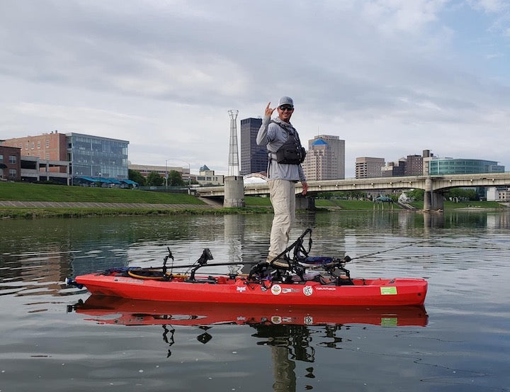 Brad Hicks kayak fishes on Great Miami River in Dayton, OH