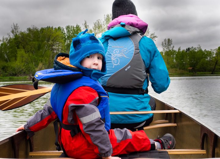 toddler with mom in canoe