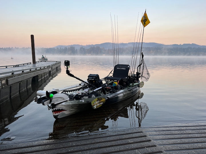 fishing kayak rigged out, including bow motor