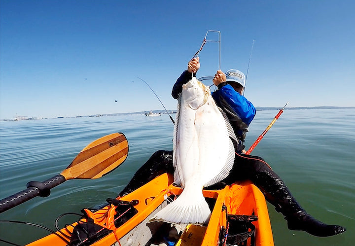 kayak angler with huge fish