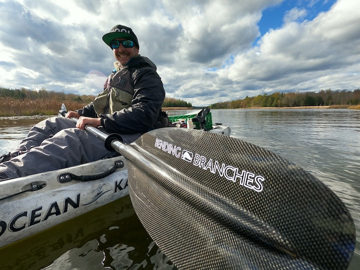 kayak angler uses Bending Branches Angler Pro Carbon paddle