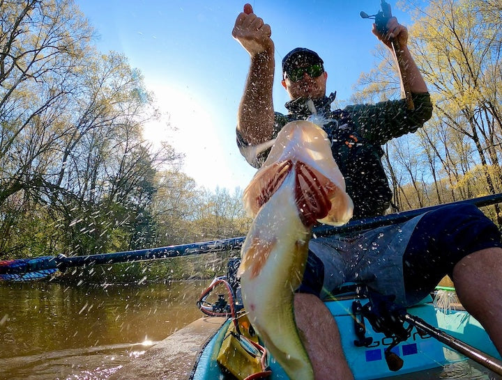 kayak angler pulls in a nice fish