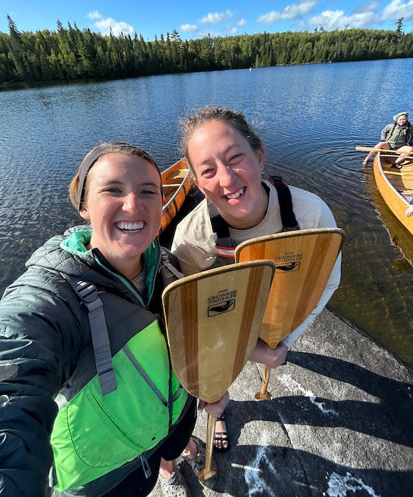two women in a selfie on a canoe trip