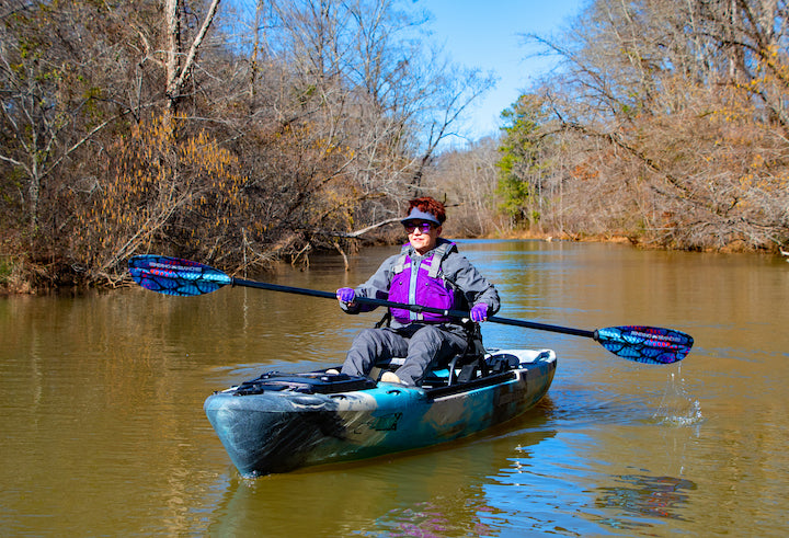 woman in fishing kayak using Angler Pro paddle