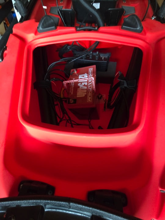batteries inside a kayak's front hatch